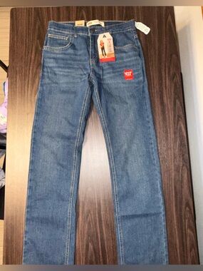 Levi's Blue Denim Jeans with Red Logo Tag